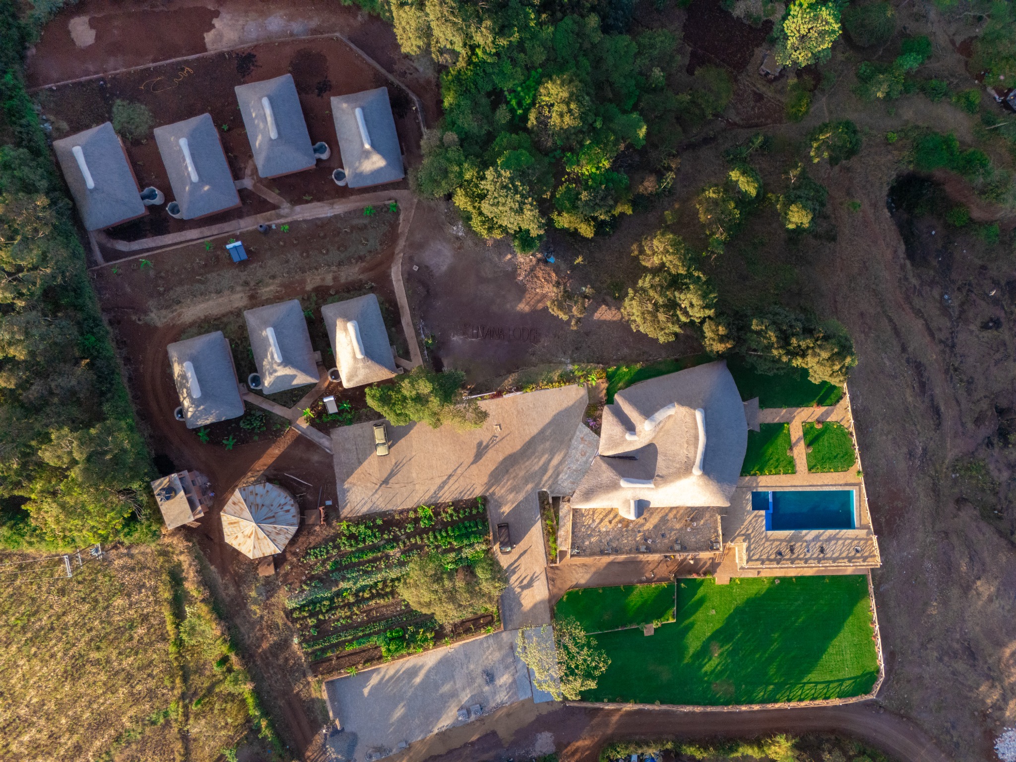 Aerial view of Kutana Lodge pool, gardens and suites