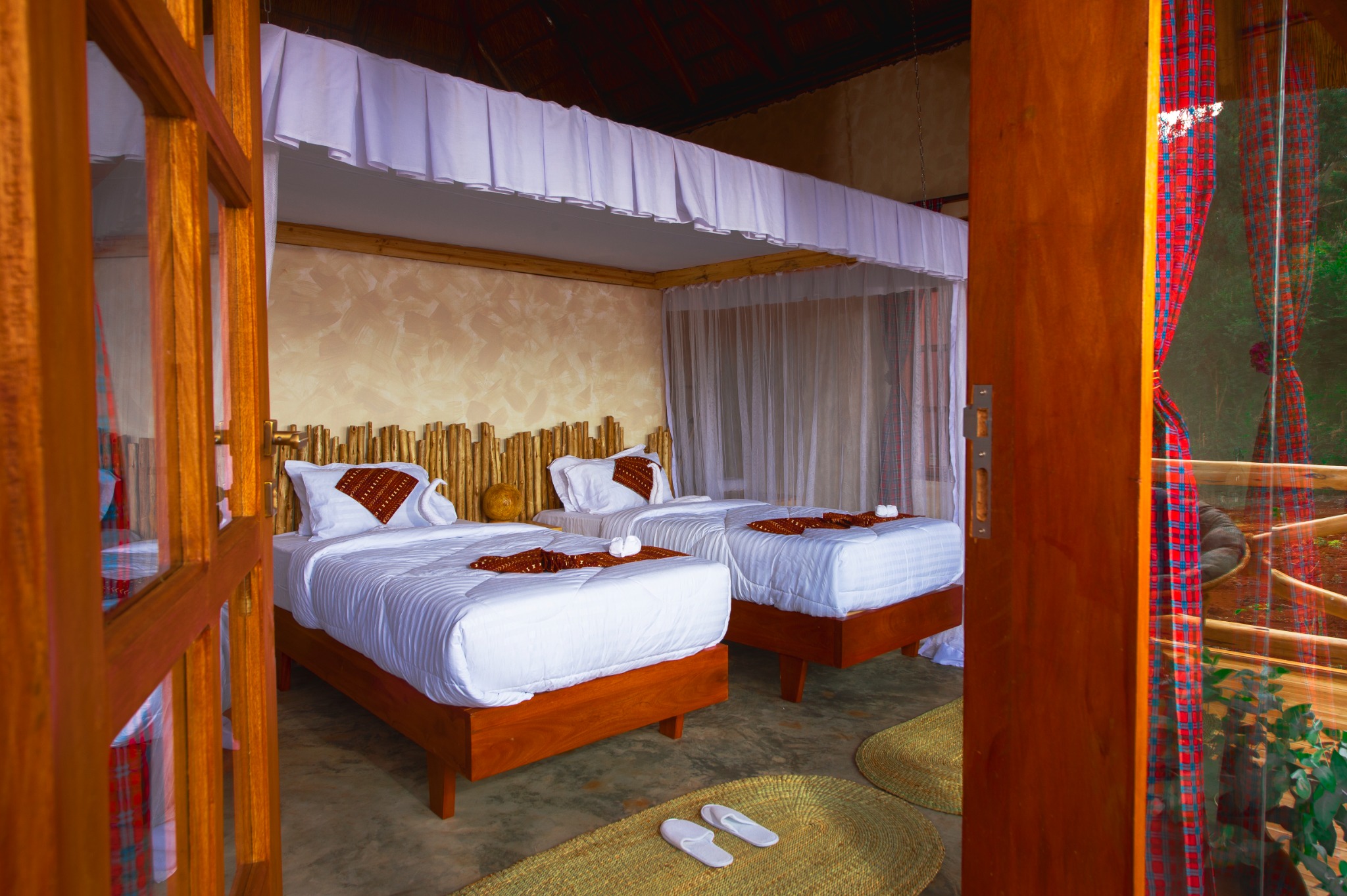 Twin beds in a Kutana Family Suite